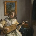 Une femme jouant de la guitare en 1671